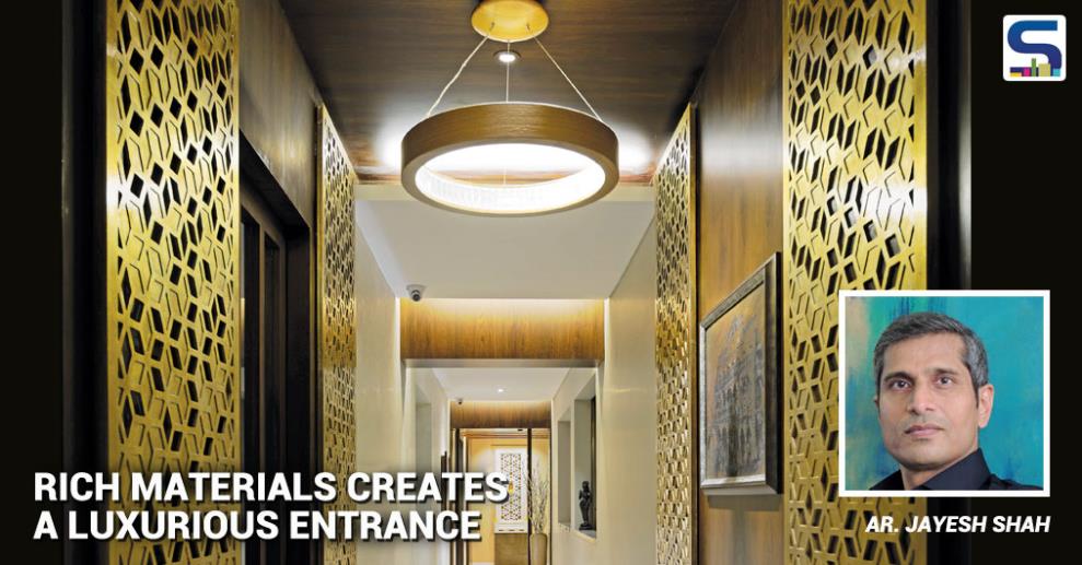 This is the entry passage of a residence in South Mumbai. Since the passage is long and narrow, a full length mirror is used effectively to widen up the space at the main door.