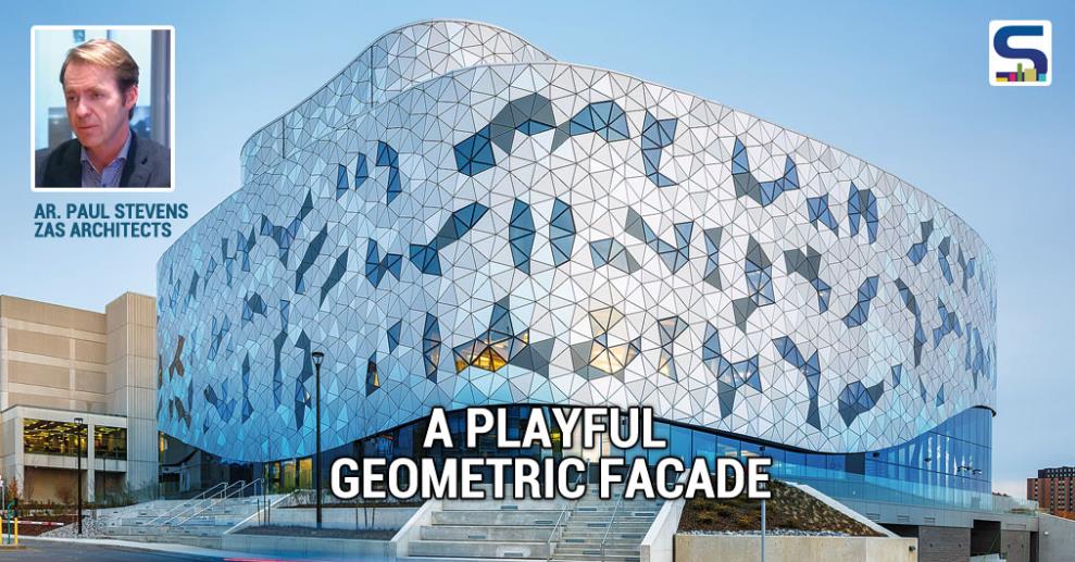 The facade of the building is made from a series of triangles positioned according to a precise algorithm. The passing clouds are reflected in the facade that envelops the innovative interior.