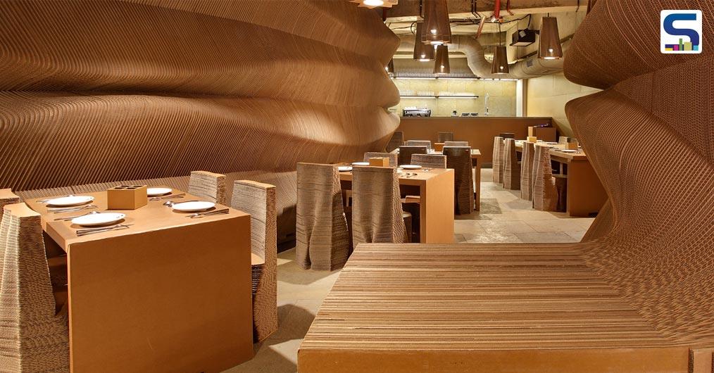 Sited in Mumbai’s central business district, Bandra Kurla Complex, Cardboard Bombay is a cafetaria located on the ground floor designed by Nuru Karim, the founder of Nudes- an Indian Architecture Studio