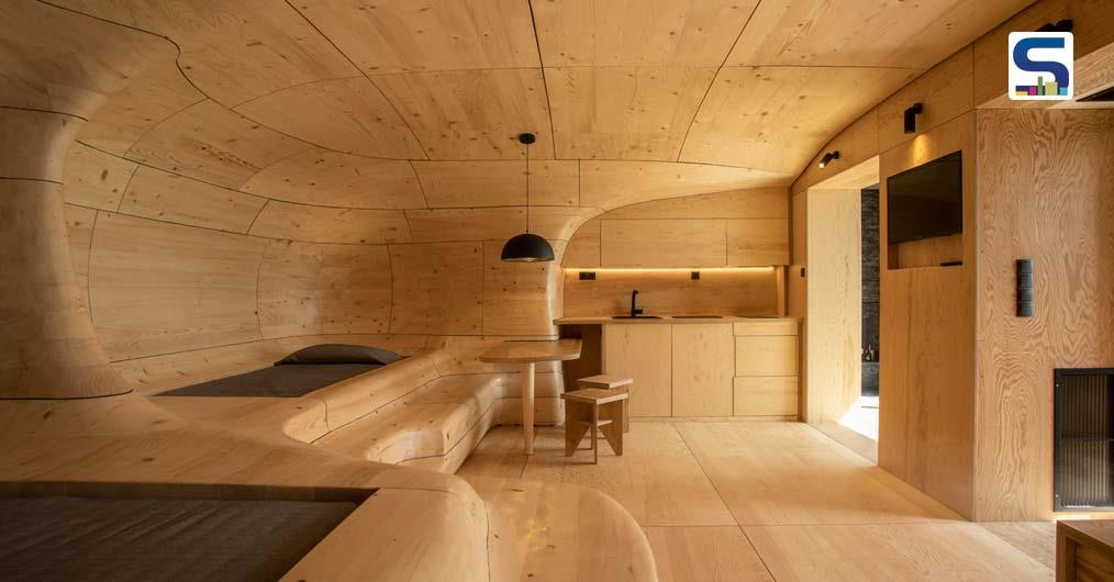 Over 1,000 Pieces of Hand-Cut Wood Lines The Interiors of This Cave-like Hotel in Greece