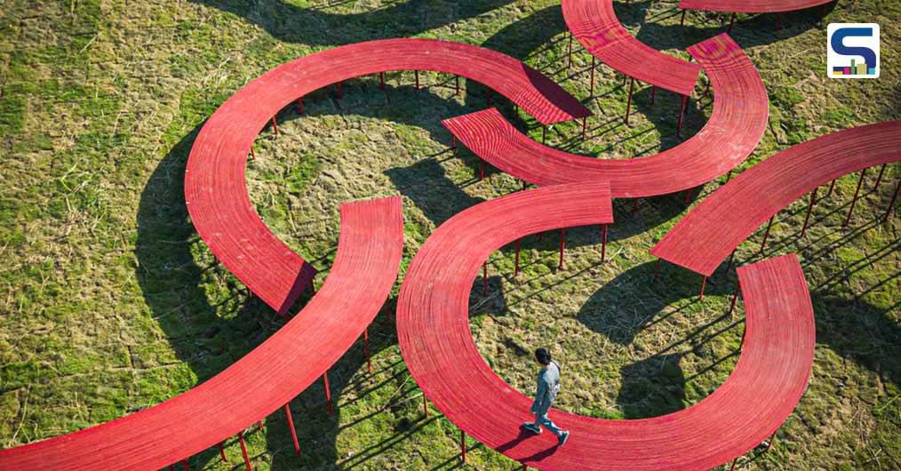 Eight Curved Elevated Red Walkways | Bangkok Project Studio