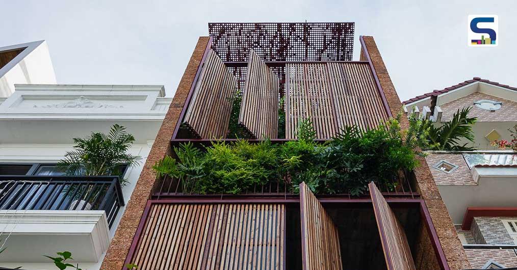 This Sustainable House in Vietnam Breathes Through 8 Revolving Wooden Doors on Its Facade | H House | AD9 architects