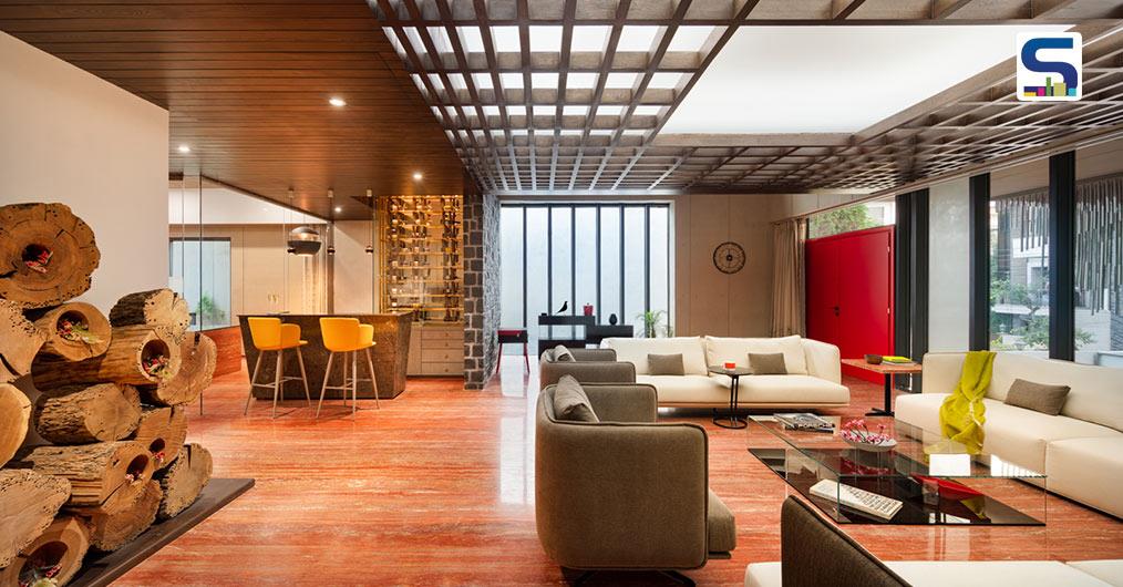 Built on vernacular design aspects, Hanging House in Noida flaunts Red Travertine and Kadappa Flooring that reinforces the overall rusticity of the home.
