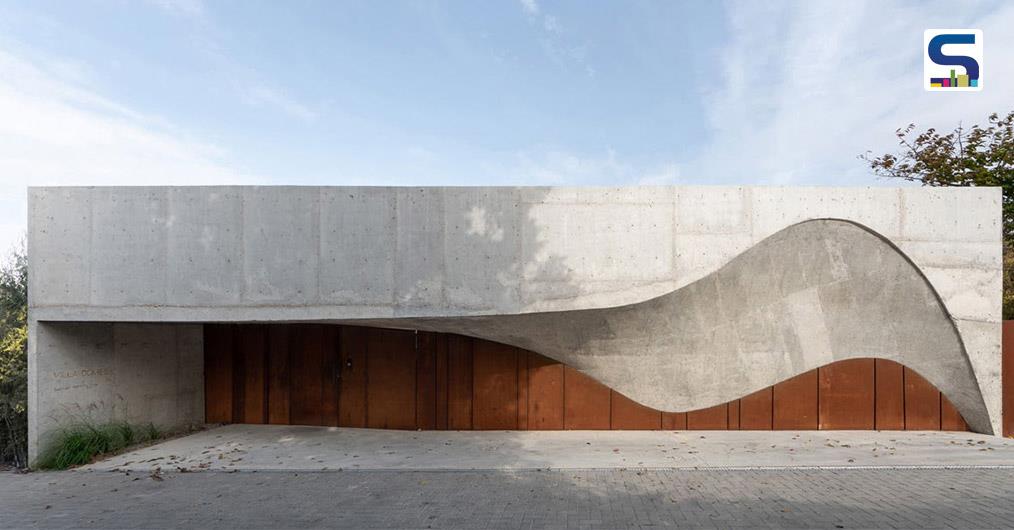 Wavy Concrete Form Softens The Corten Steel Frame of This house | Arresting Entrance | Moldova | Calujac Architecture