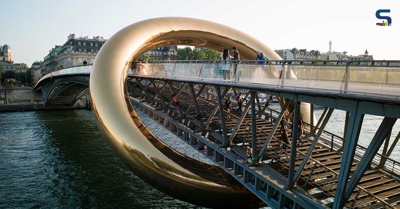 Plastique Fantastiques Spectacular Ringed Installation Transforms a Parisian Footbridge | Nuit Blanche 2023