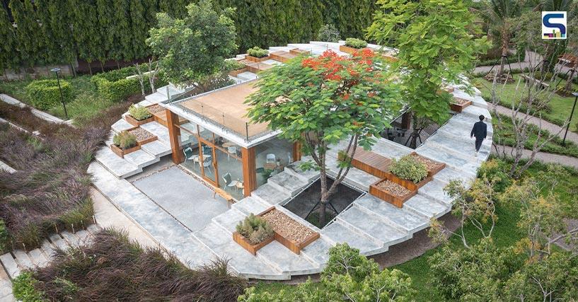Looklen Architects Integrates a Rectangular Glass Cafe into a Circular Concrete Amphitheatre | Thailand