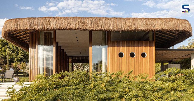 Debaixo do Blocos 3 Box House in Goiás, Brazil, beautifully combines architecture and nature. It makes the most of the green surroundings, amazing sunsets, and a nearby private lake, which all contribute to the projects background.
