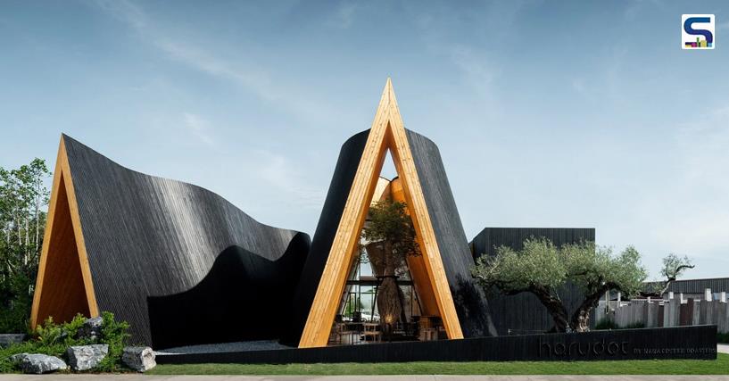 A Curved and Dynamic Cafe in Thailand, Featuring Unique Gabled Forms Clad in Blackened Wood | IDIN Architects
