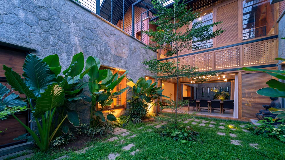 Multiple Green Spaces Shape The Placid Nature of This Open Living House ...