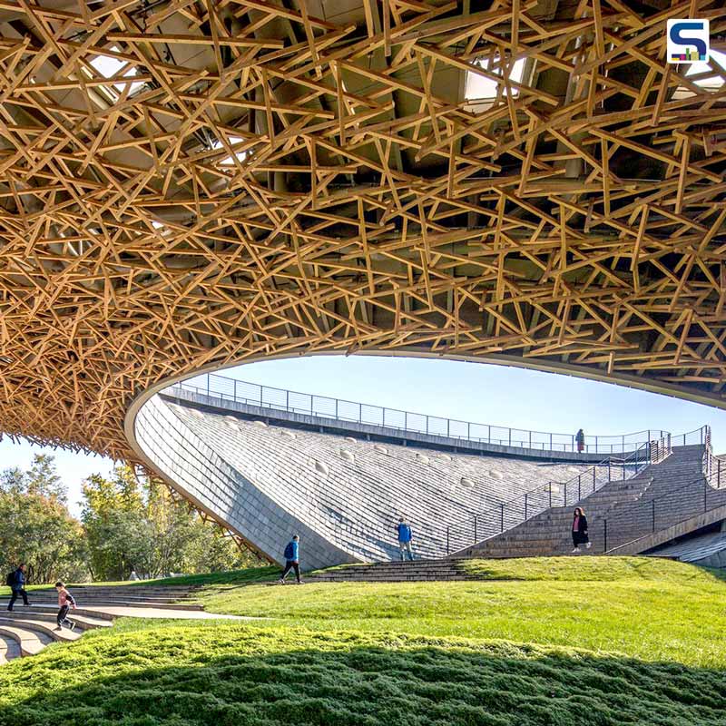 Zhu Pei Designs An Organic Landscape Underneath The Cantilevered Latticed Roof Of This Performing Arts Center In China