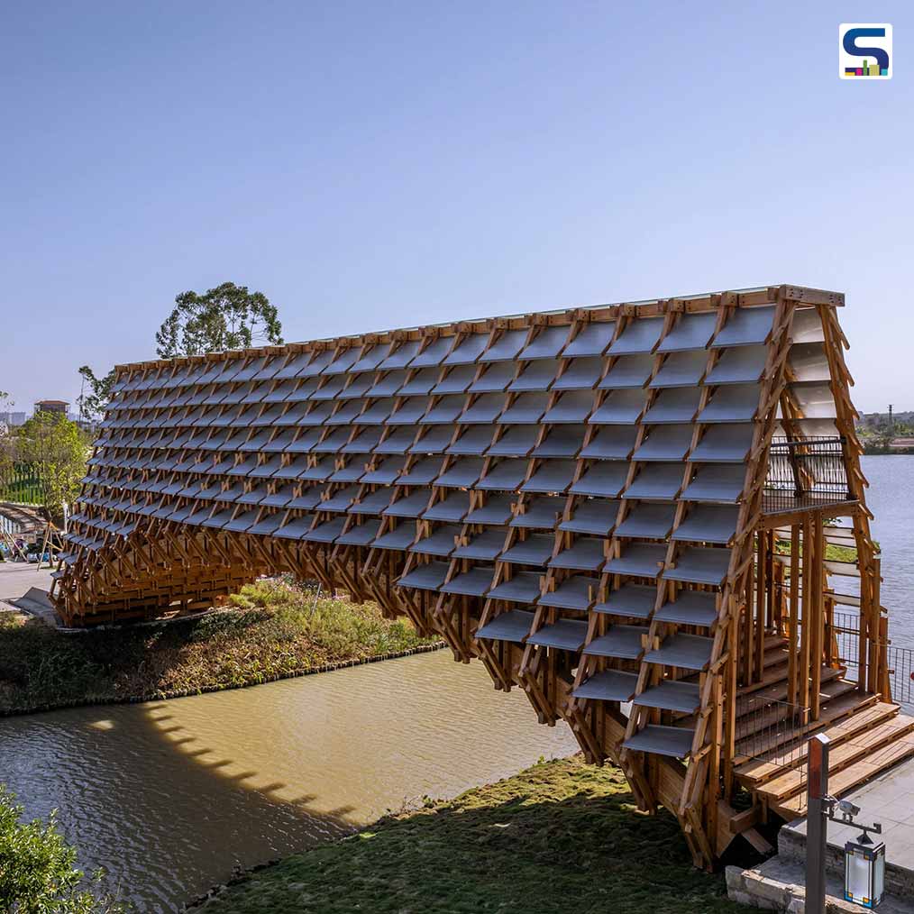Chinese LUO Studio Uses Hundreds of Wooden Elements To Create This 25-meter-long Arched Timber Bridge in Gulou Waterfront