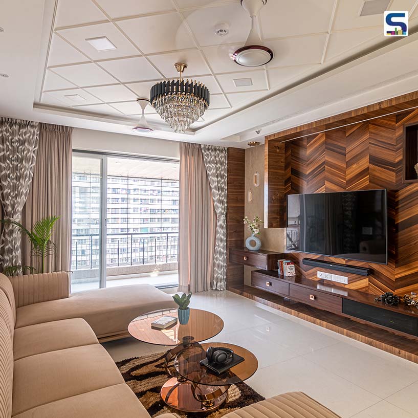 The designer enlivens the interiors of this flat- “Summer Home” in Ambernath, Thane using a combination of veneers.