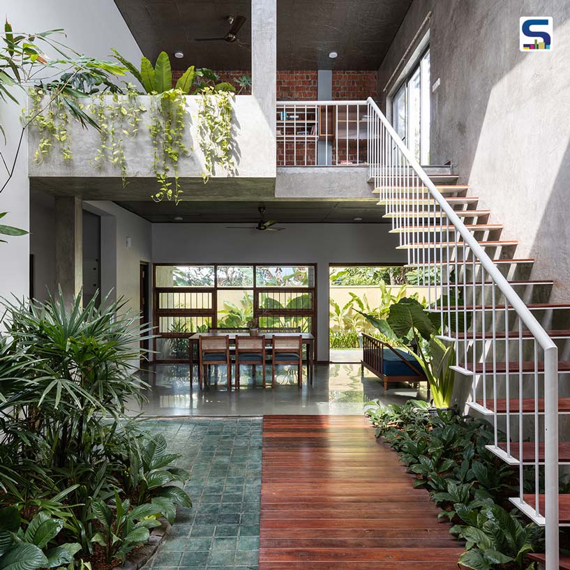 Reclaimed Wood, Kota Stone, Exposed Concrete And Brick Give A Rustic Yet Refined Appeal To This Lush Cochin House | VSP Architects