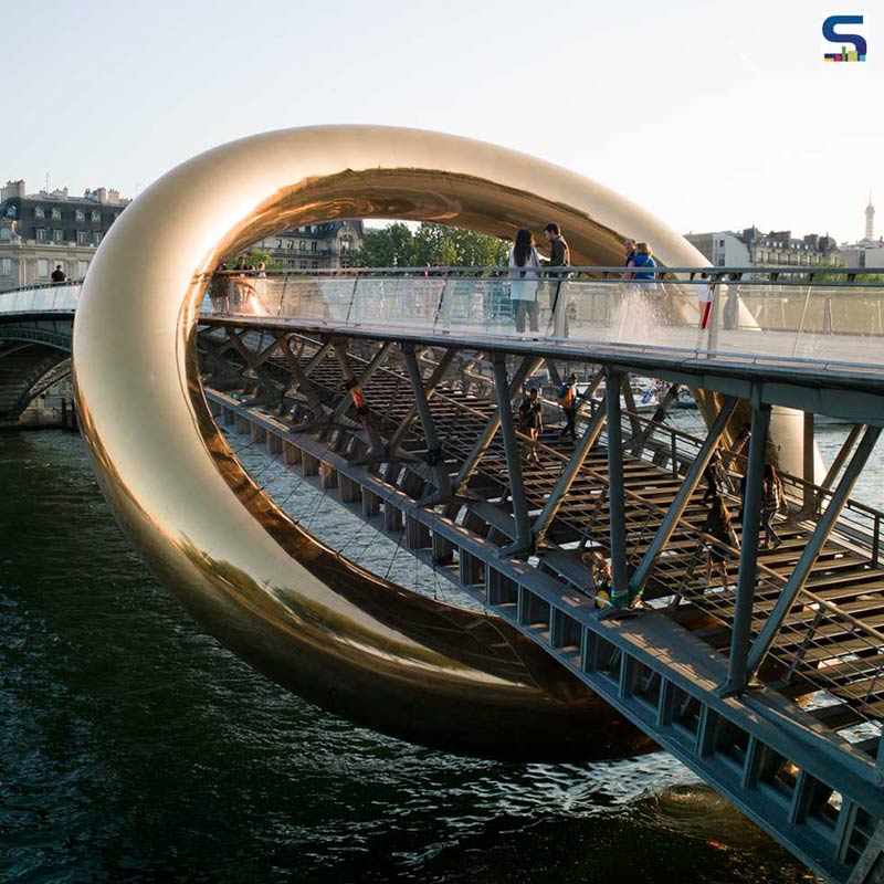 Plastique Fantastiques Spectacular Ringed Installation Transforms a Parisian Footbridge | Nuit Blanche 2023