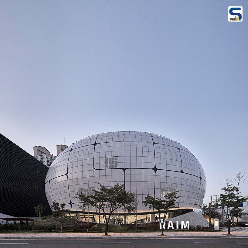 Seoul’s new Robot & AI Museum (RAIM), designed by Melike Altinisik Architects, is an egg-shaped, tile-clad space dedicated to robotics and AI.